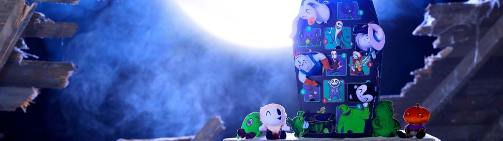 Nightmare Before Christmas plush advent calendar featuring small stuffed characters like Zero, Sally, and Oogie Boogie in numbered slots.