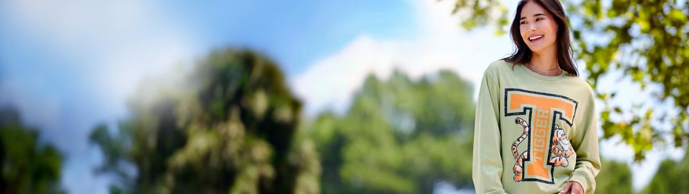 Young woman wearing a red Beauty and the Beast shirt featuring a design of Belle.